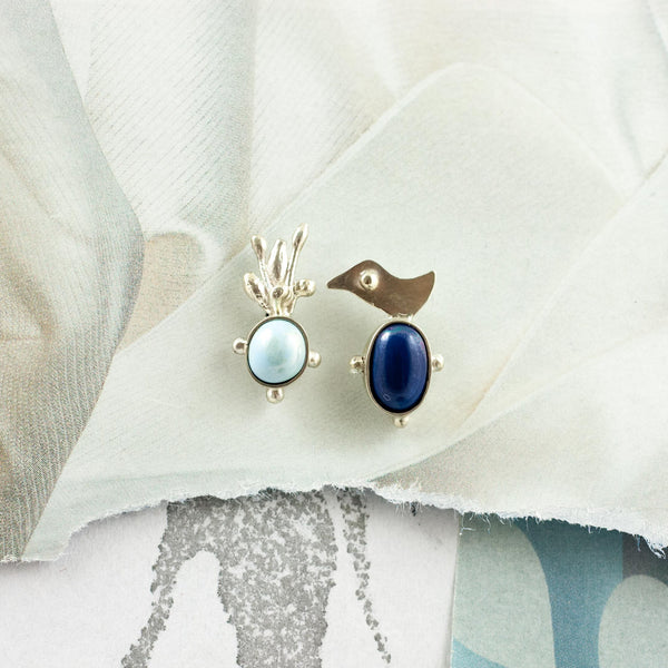 Blue BON BON mismatched earrings with a silver bird