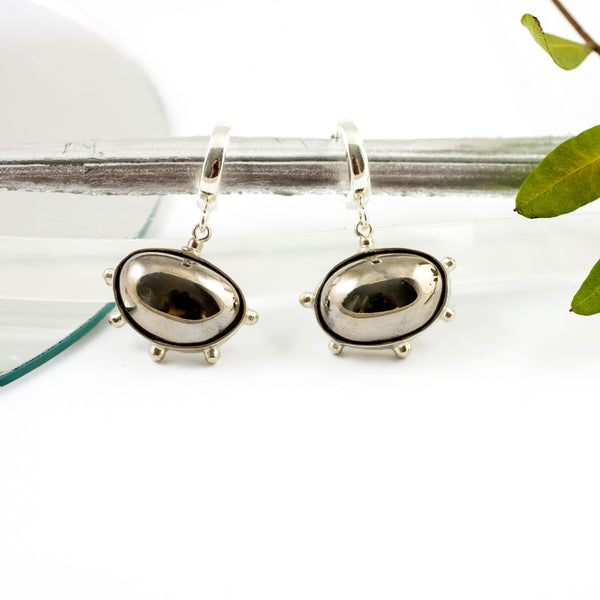 DROPS mismatched dangle earrings with platinum luster