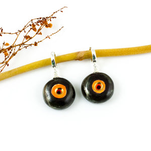 Black and orange BON BON dangle earrings