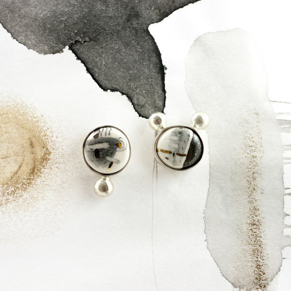 White and black earrings with ceramics