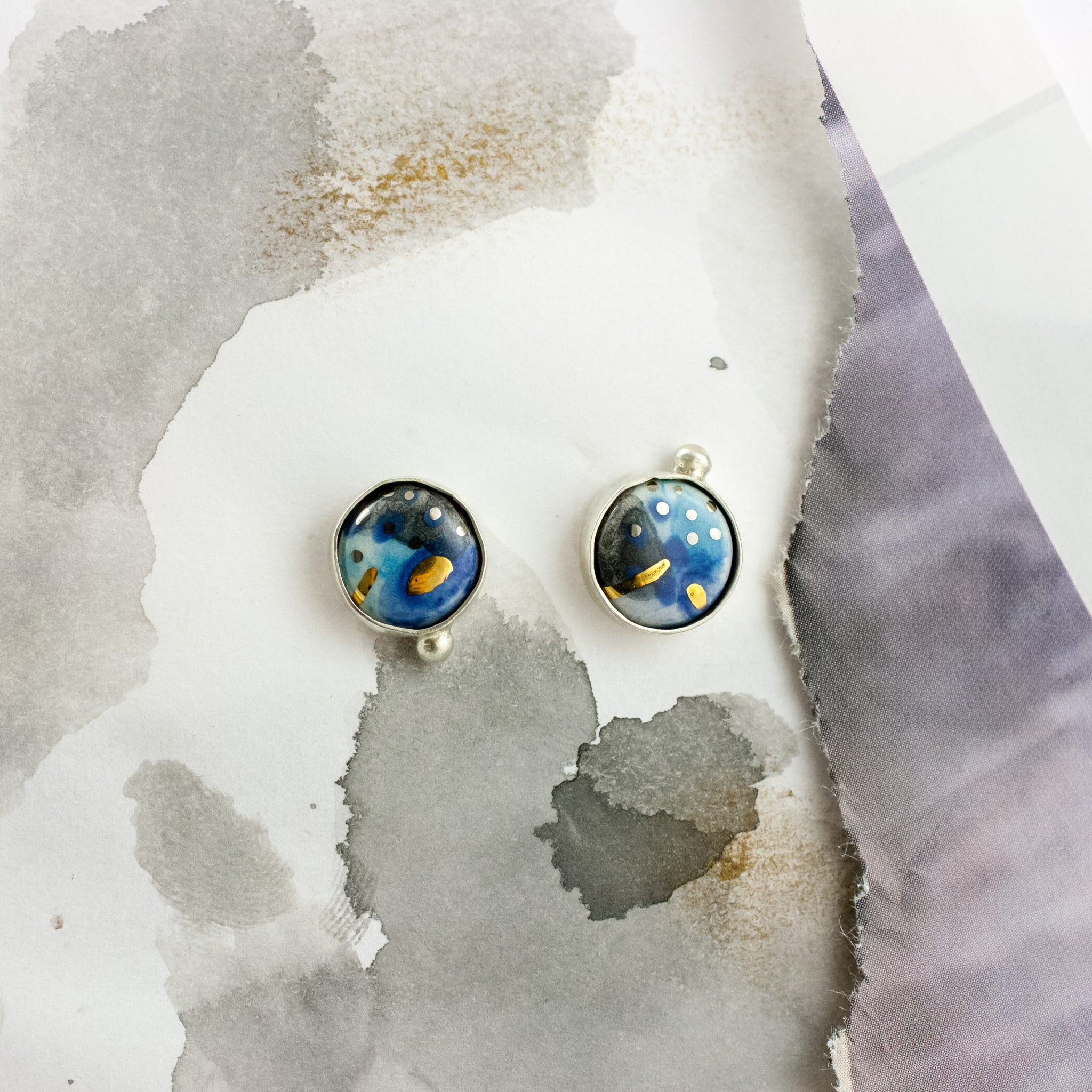 Small blue and black color earrings with dots
