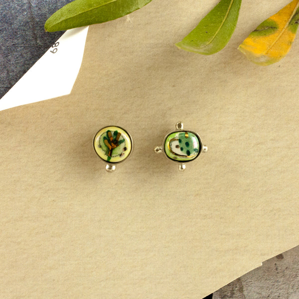 Green BON BON earrings with a gold flower