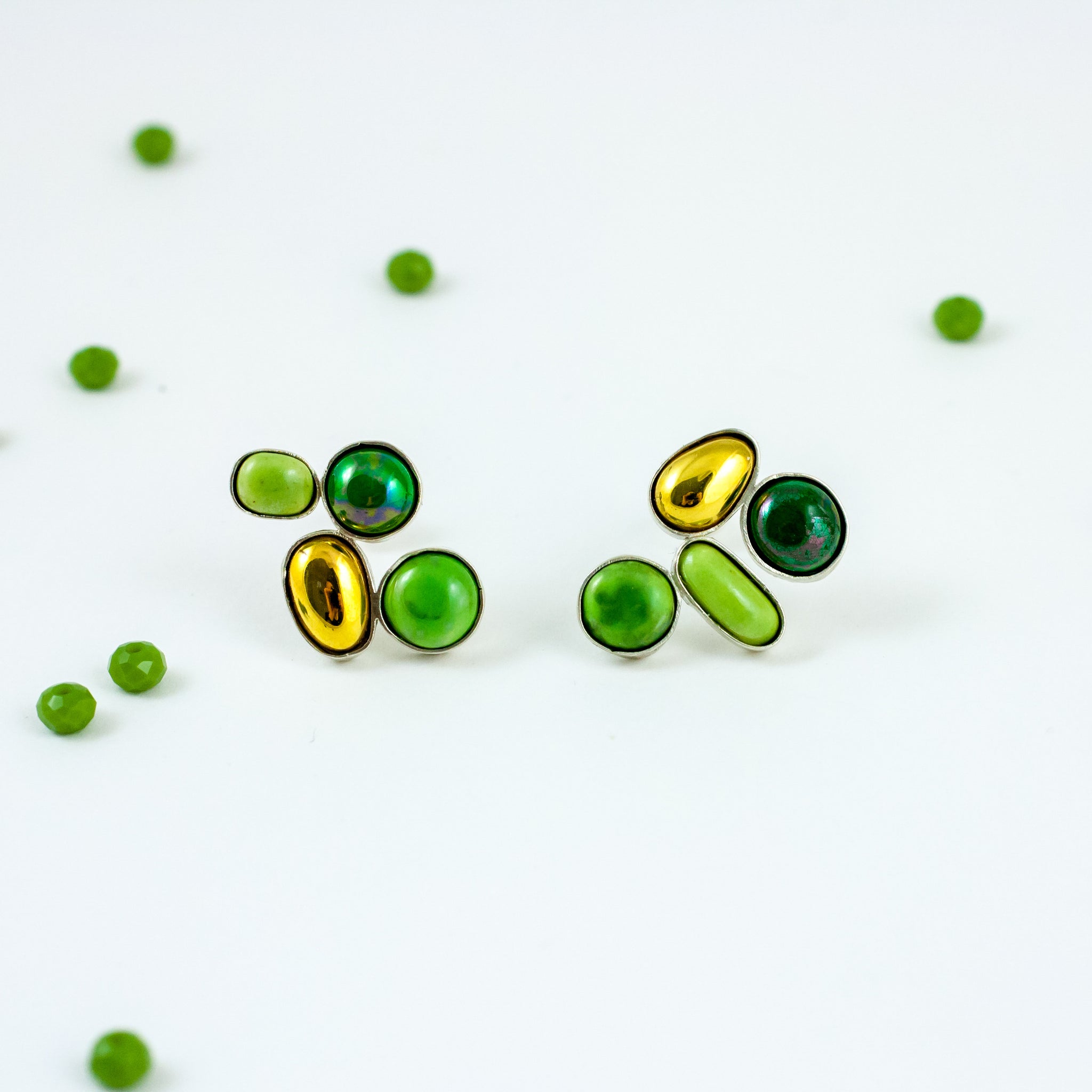 Green shades earrings with gold luster