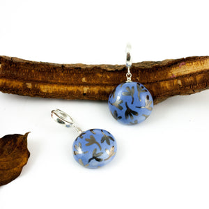 Blue dangle earrings with platinum luster flowers