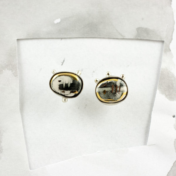 ABSTRACT White mismatched silver earrings with ceramics
