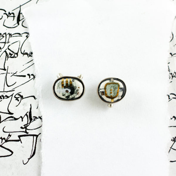 White graphic small stud earrings ABSTRACT