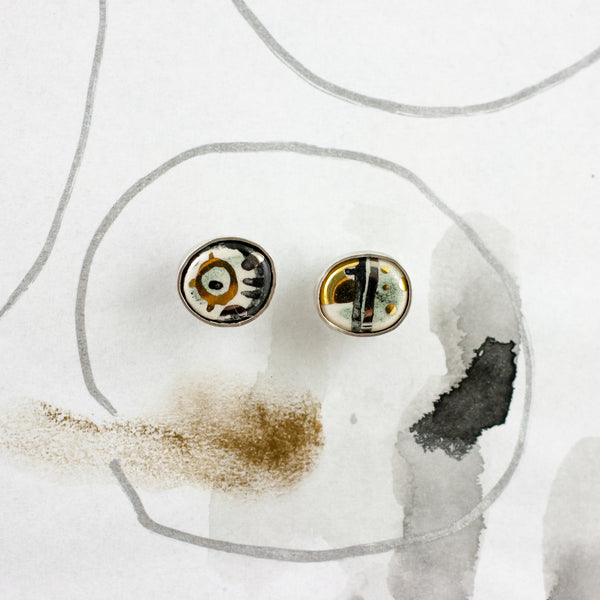 Round and oval form stud earrings ABSTRACT