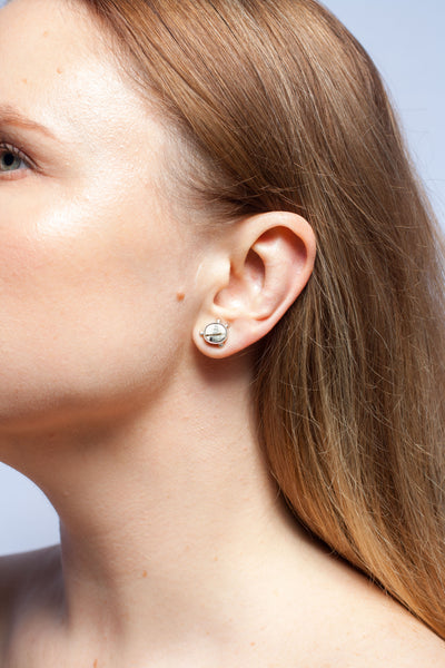 ABSTRACT Mismatched mini stud earrings