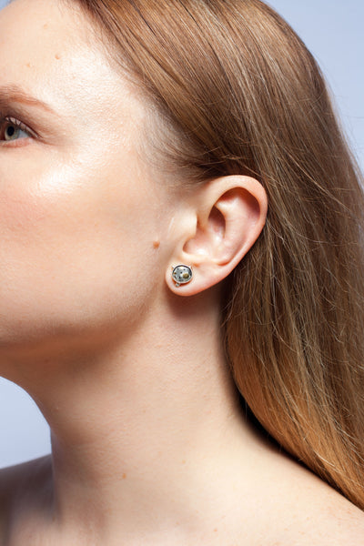 ABSTRACT Mismatched mini stud earrings