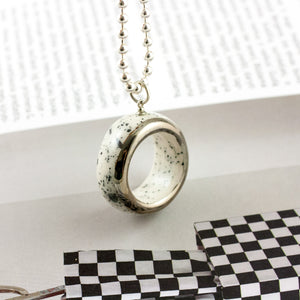 White round pendant with platinum luster decor