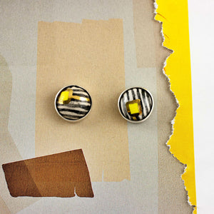 Yellow round earrings with black stripes