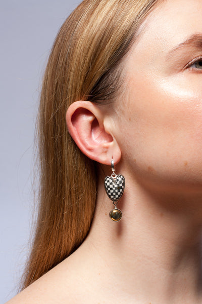 Dangle mismatched earrings with platinum and gold lusters
