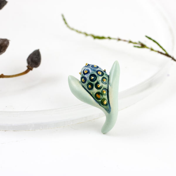 Mint flower bud form ceramic brooch with gold dots