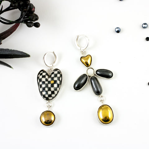 Dangle mismatched earrings with platinum and gold lusters
