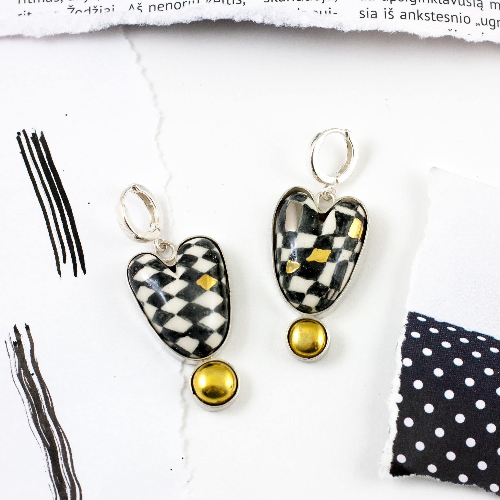 Dangle mismatched checked heart shaped silver earrings