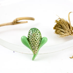 Green color flower bud form brooch with spots