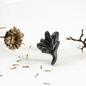 Black organic form brooch