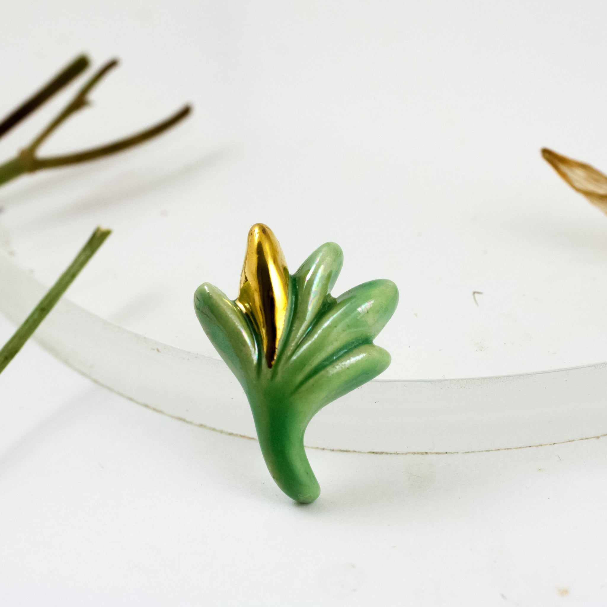 Green color flower bud form brooch with gold decor