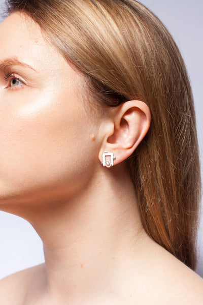 Asymmetrical silver stud earrings with rose pink freshwater pearls