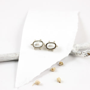 Stud silver earrings with white freshwater pearls
