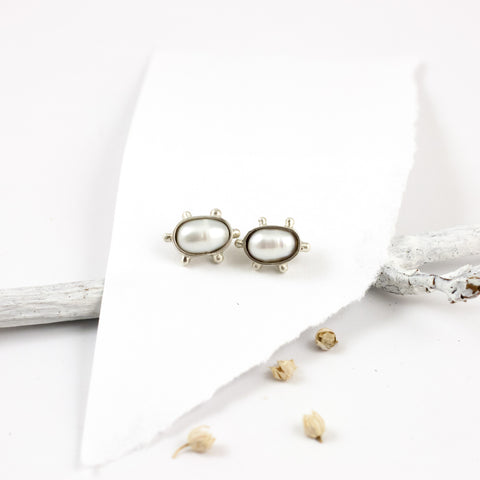 Stud silver earrings with white freshwater pearls
