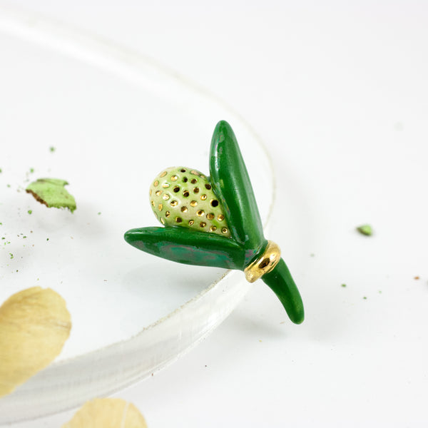Green color organic form brooch with gold dots - Aiste Jewelry
