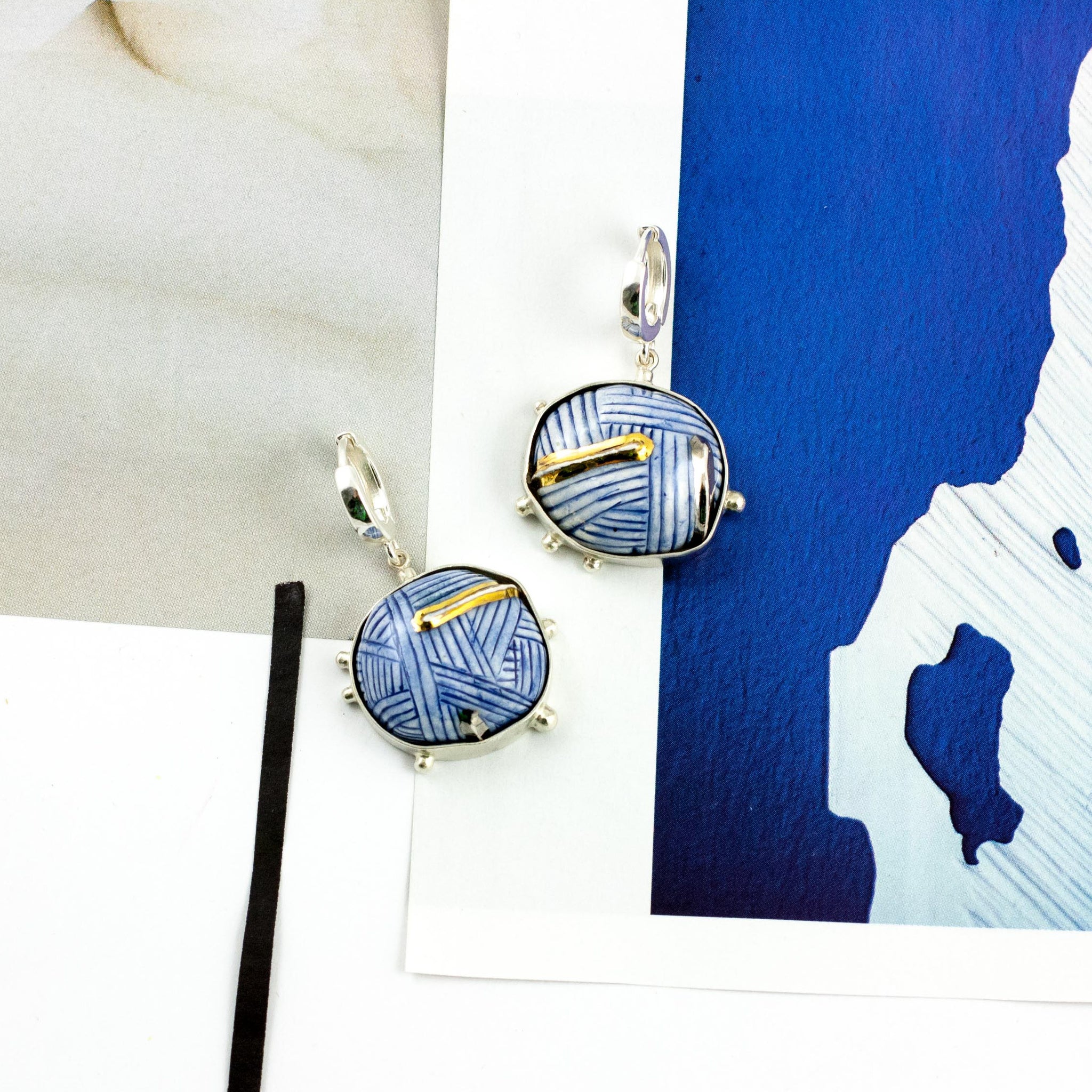 Blue dangle earrings with gold and platinum luster lines - Aiste Jewelry