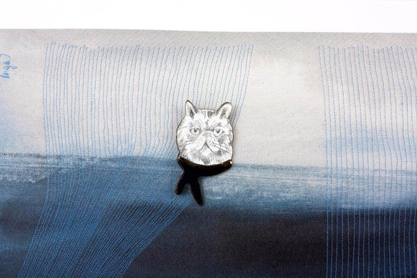 Enamel pin Cat with a blue scarf - Aiste Jewelry
