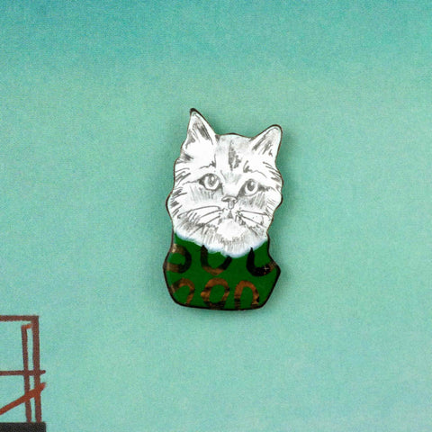 Enamel pin Cat with a green sweater - Aiste Jewelry