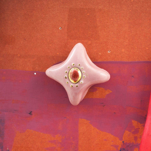 blush pink brooch with golden center
